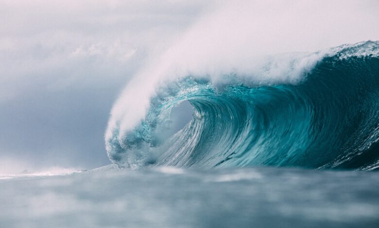 white and blue ocean waves