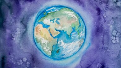 a watercolor painting of the earth in space