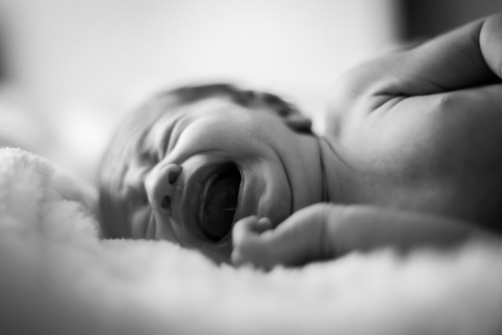 a baby with its mouth open