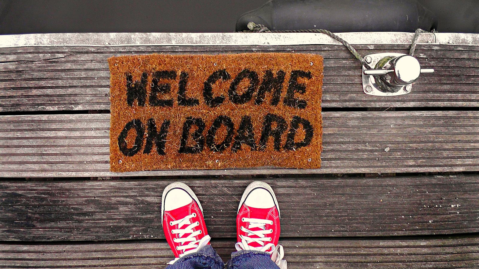 Zerbino welcome con scarpe rosse — abitudine sana entrando in casa
